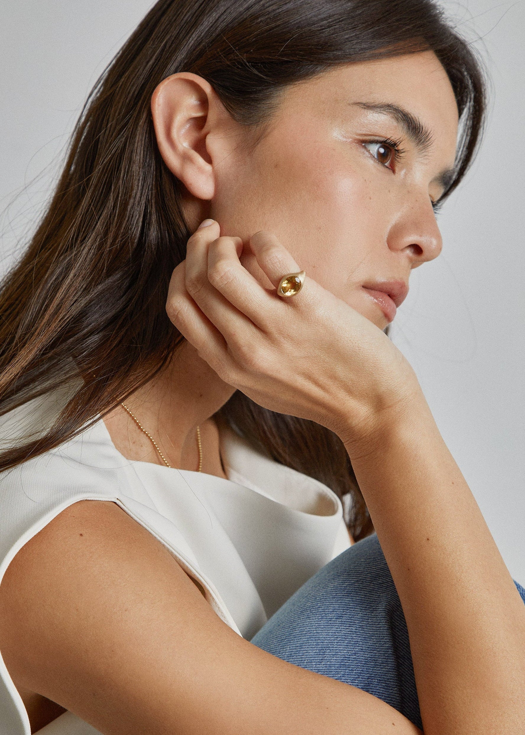 YAKU pinky ring worn on hand, brushed gold and citrine by DALINDA