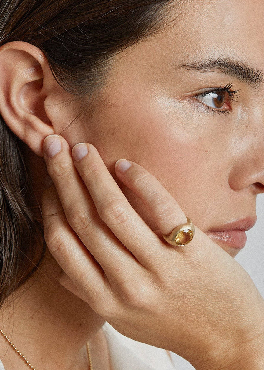 YAKU pinky ring worn on hand, brushed gold and citrine by DALINDA