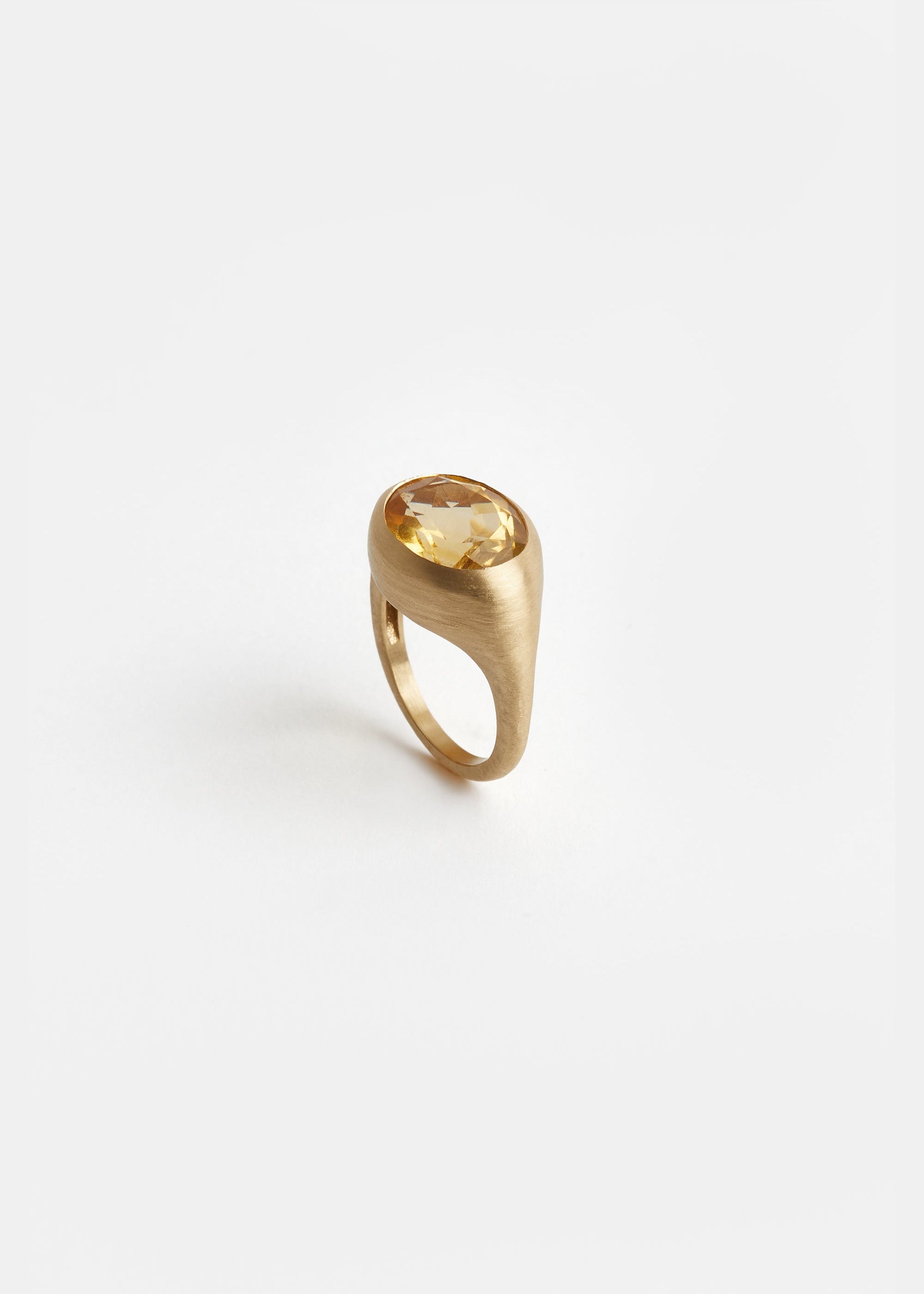 Brushed gold texture detail on YAKU pinky ring by DALINDA